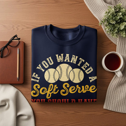 Navy sweatshirt with "If you wanted Soft Serve" and tennis balls graphic.