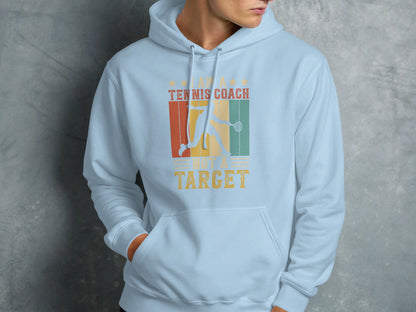 Light blue hoodie with "Tennis Coach, Not a Target" text and tennis graphic.