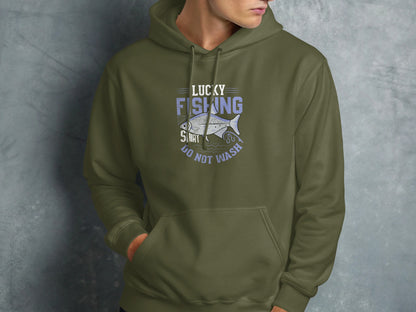 Olive green hoodie with "Lucky Fishing Shirt Do Not Wash" text and fish graphic.