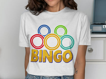 White t-shirt with colorful rings and "BINGO" text.