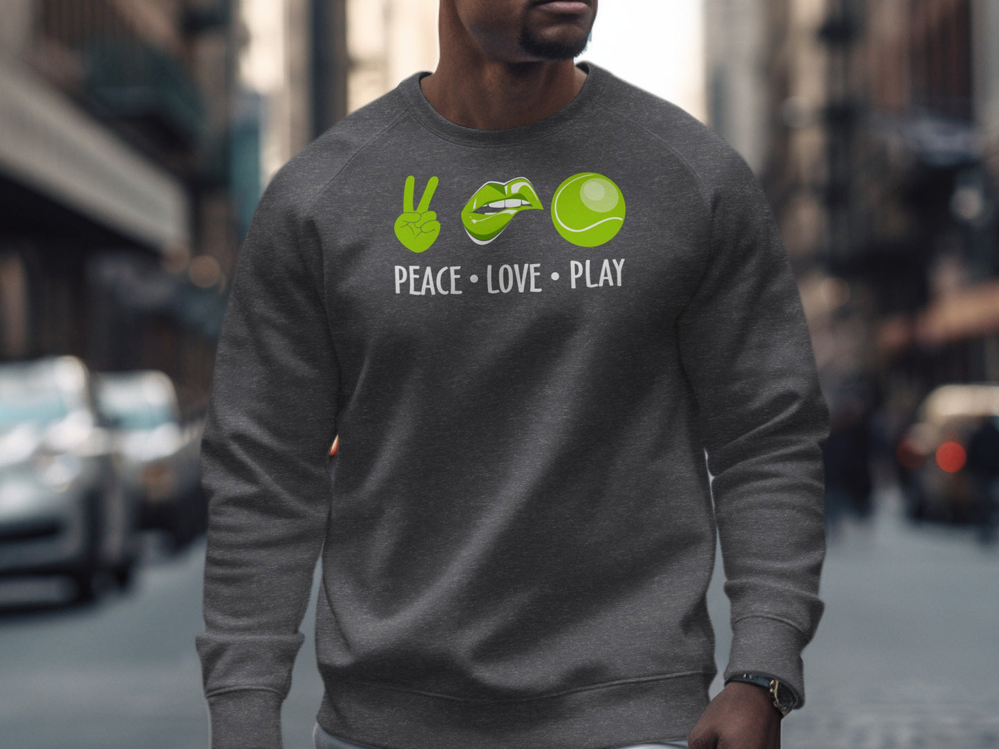 Gray sweatshirt with "Peace Love Play" text and icons of lips, tennis ball, and peace sign.