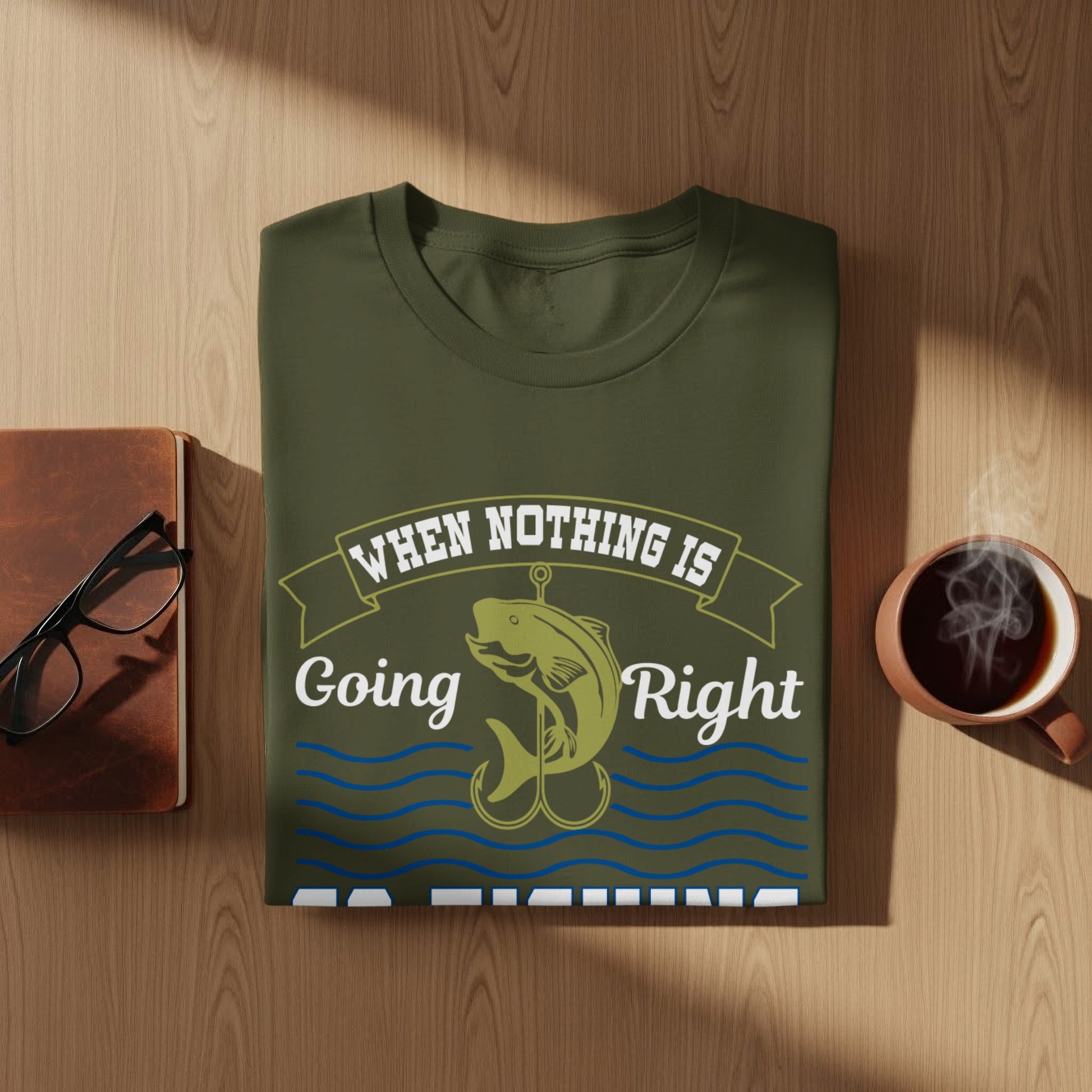 Olive green t-shirt with "When nothing is going right" text and a fishing hook.