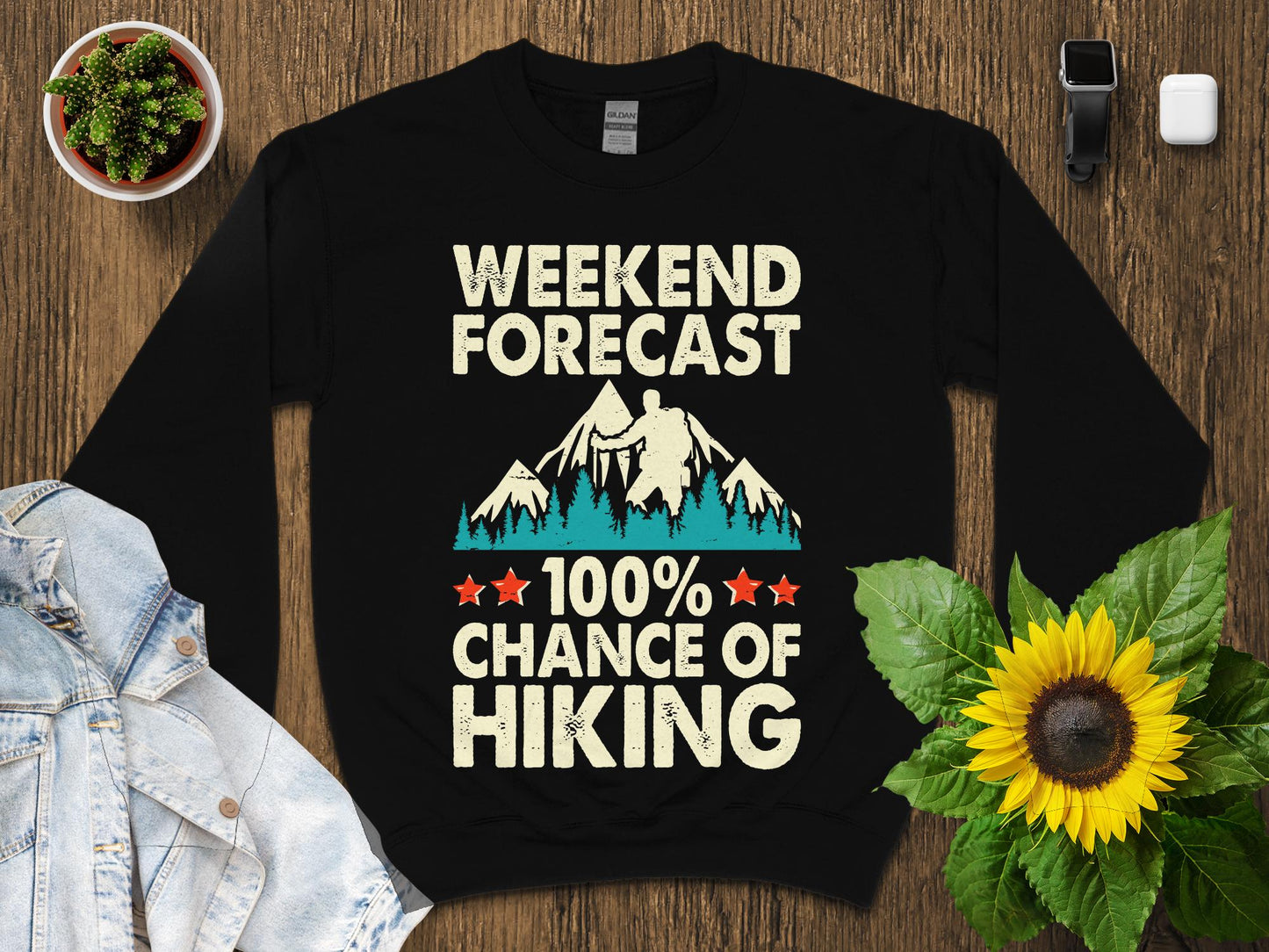 Black sweatshirt with "Weekend Forecast 100% Chance of Hiking" graphic.