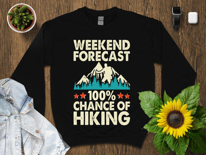 Black sweatshirt with "Weekend Forecast 100% Chance of Hiking" graphic.