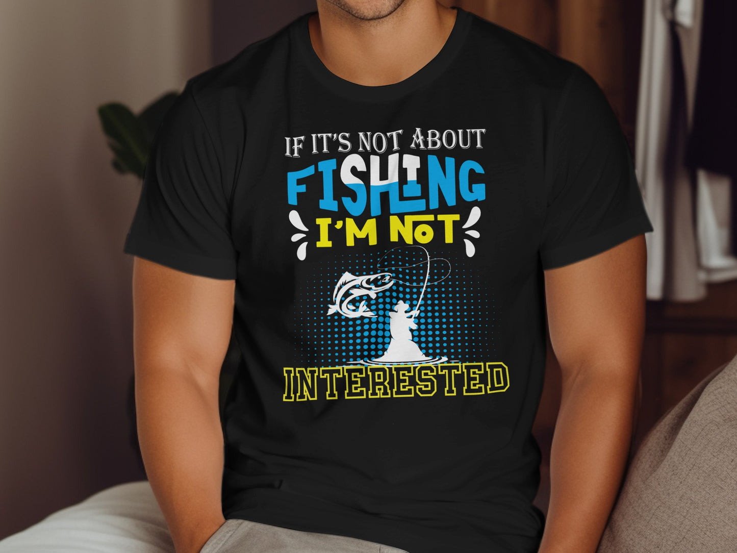 Black t-shirt with "If it's not about fishing I'm not interested" text and fishing graphic.