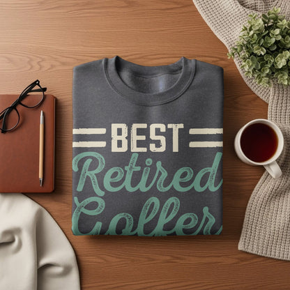 Dark grey sweatshirt with "BEST Retired Golfer" text in teal.