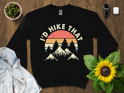 Black sweatshirt with retro mountain graphic and "I'd Hike That" text.