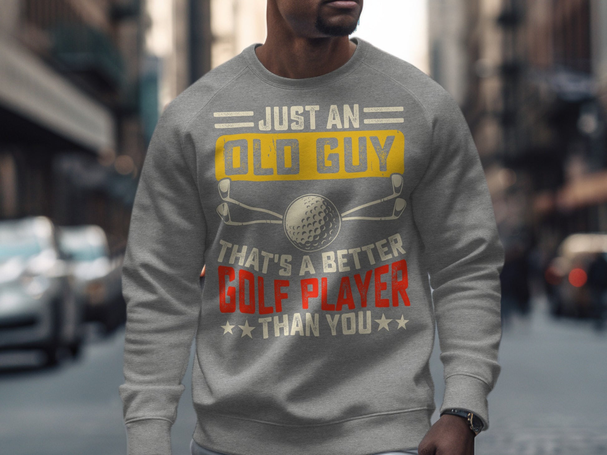 Gray sweatshirt with text "Just an old guy that's a better golf player than you".