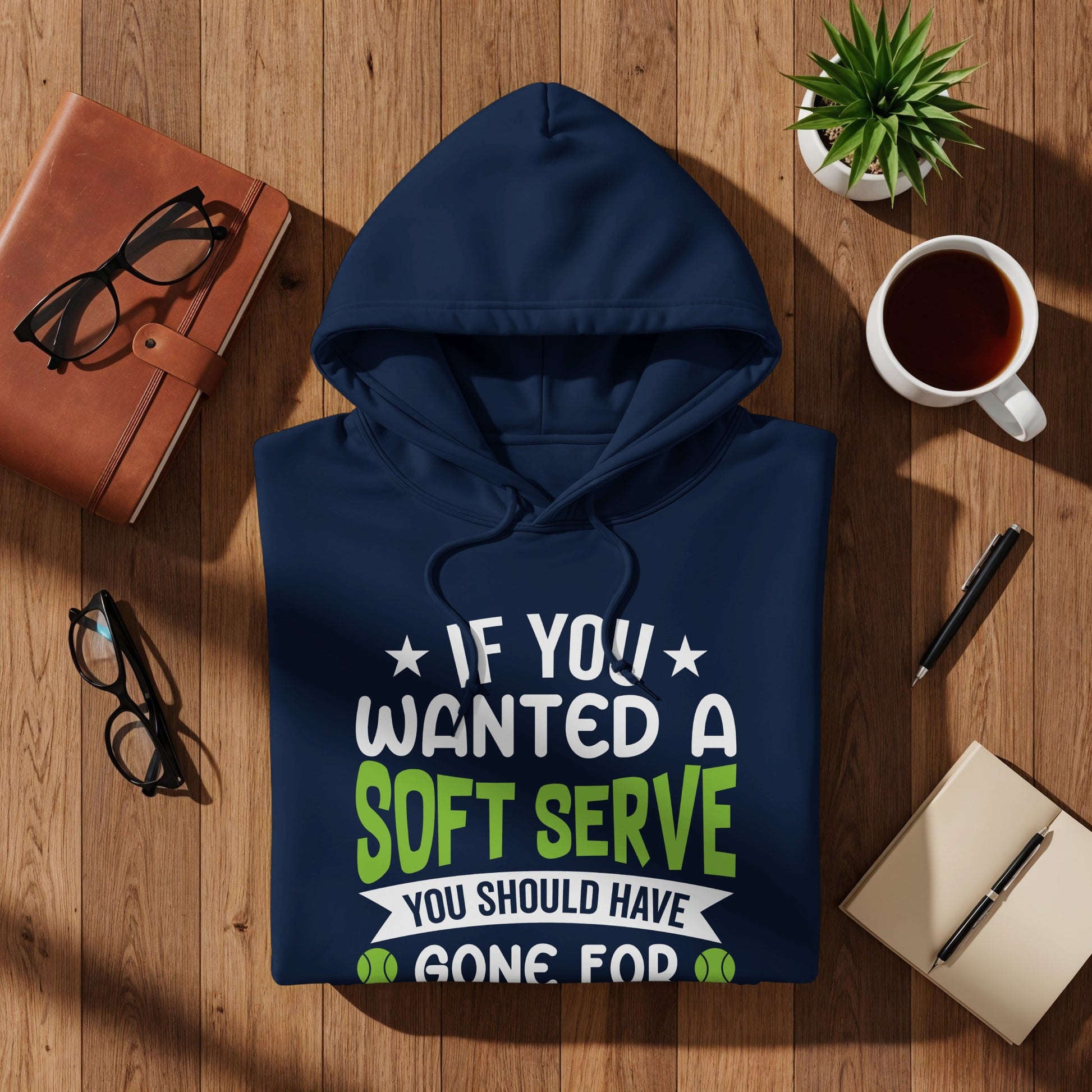 Navy hoodie with "If you wanted a soft serve you should have gone for" text.
