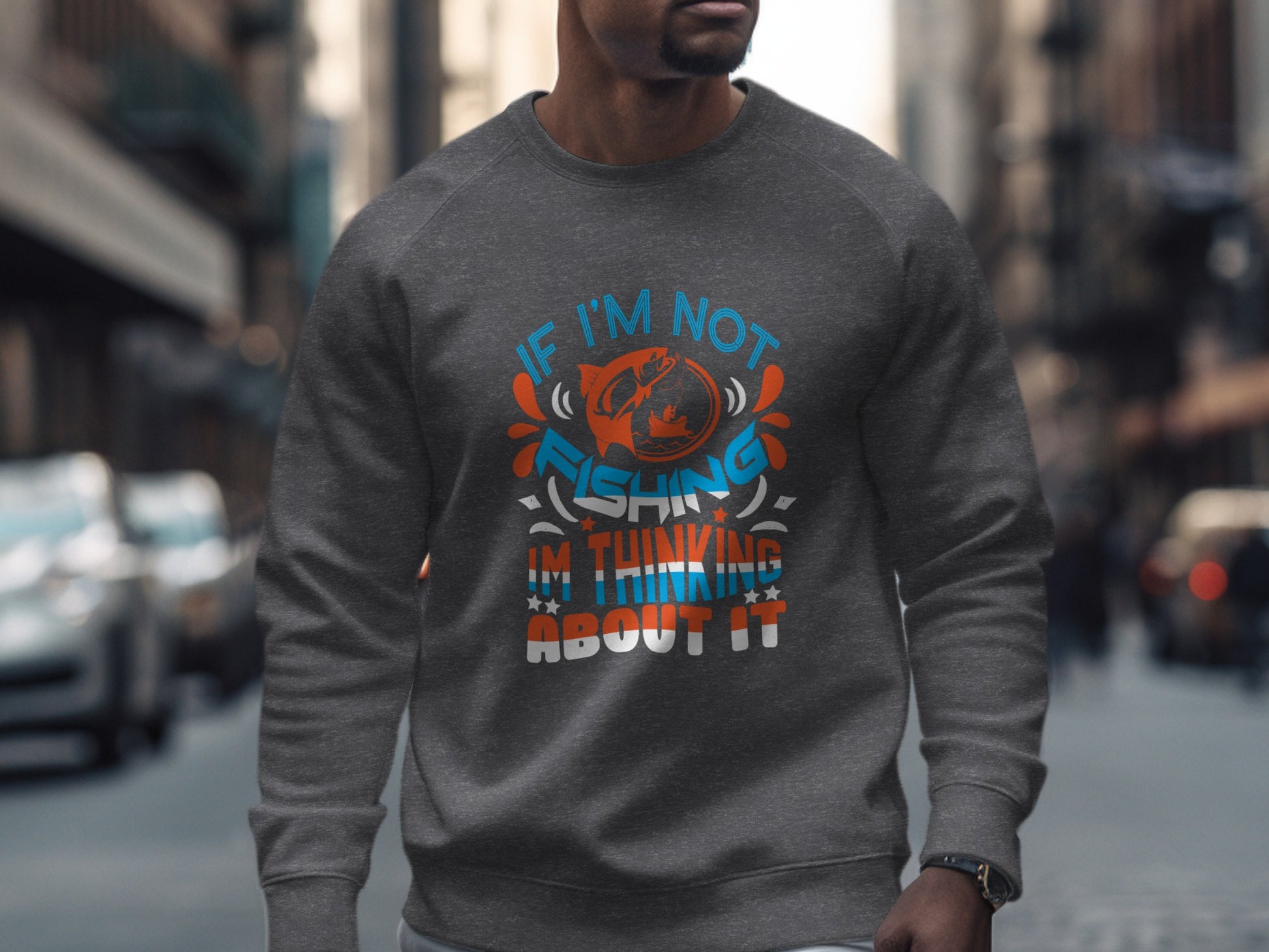 Gray sweatshirt with "If I'm not fishing I'm thinking about it" text and fish graphic.
