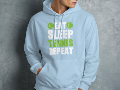 Light blue hoodie with "Eat Sleep Tennis Repeat" text and tennis ball graphics.