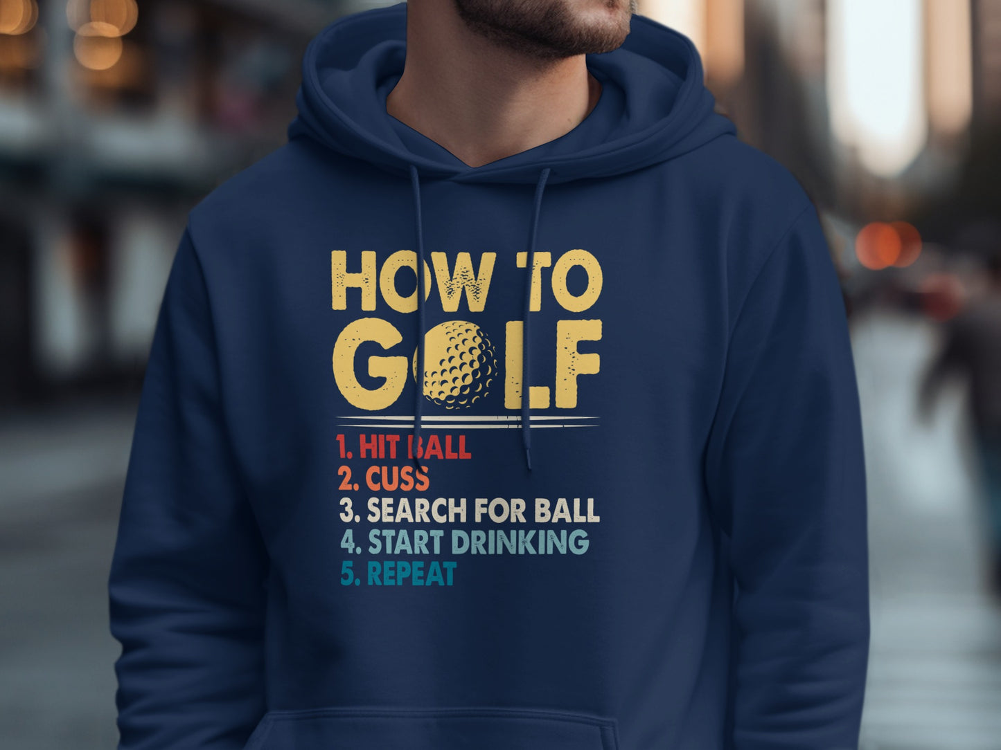 Navy hoodie with "How to Golf" instructions and golf ball graphic.
