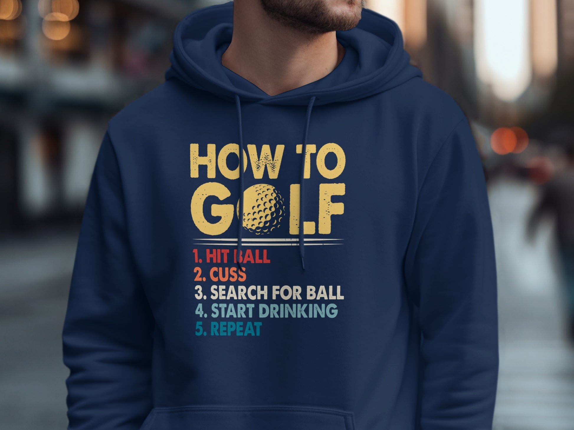 Navy hoodie with "How to Golf" instructions and golf ball graphic.