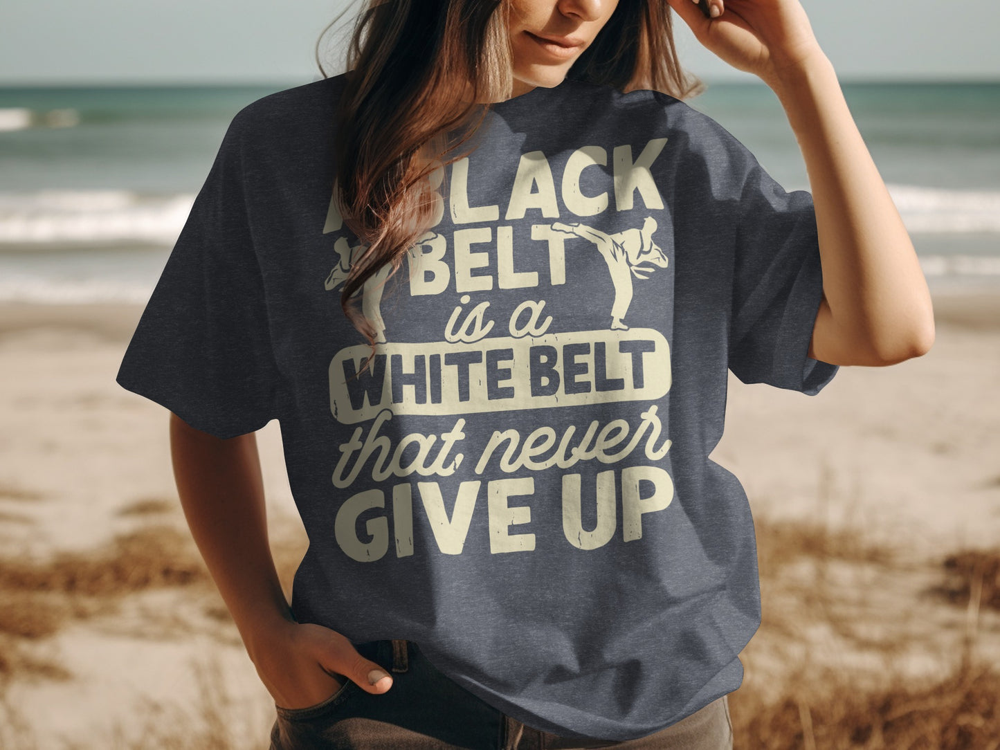 Black belt white belt never give up t-shirt with karate silhouette.