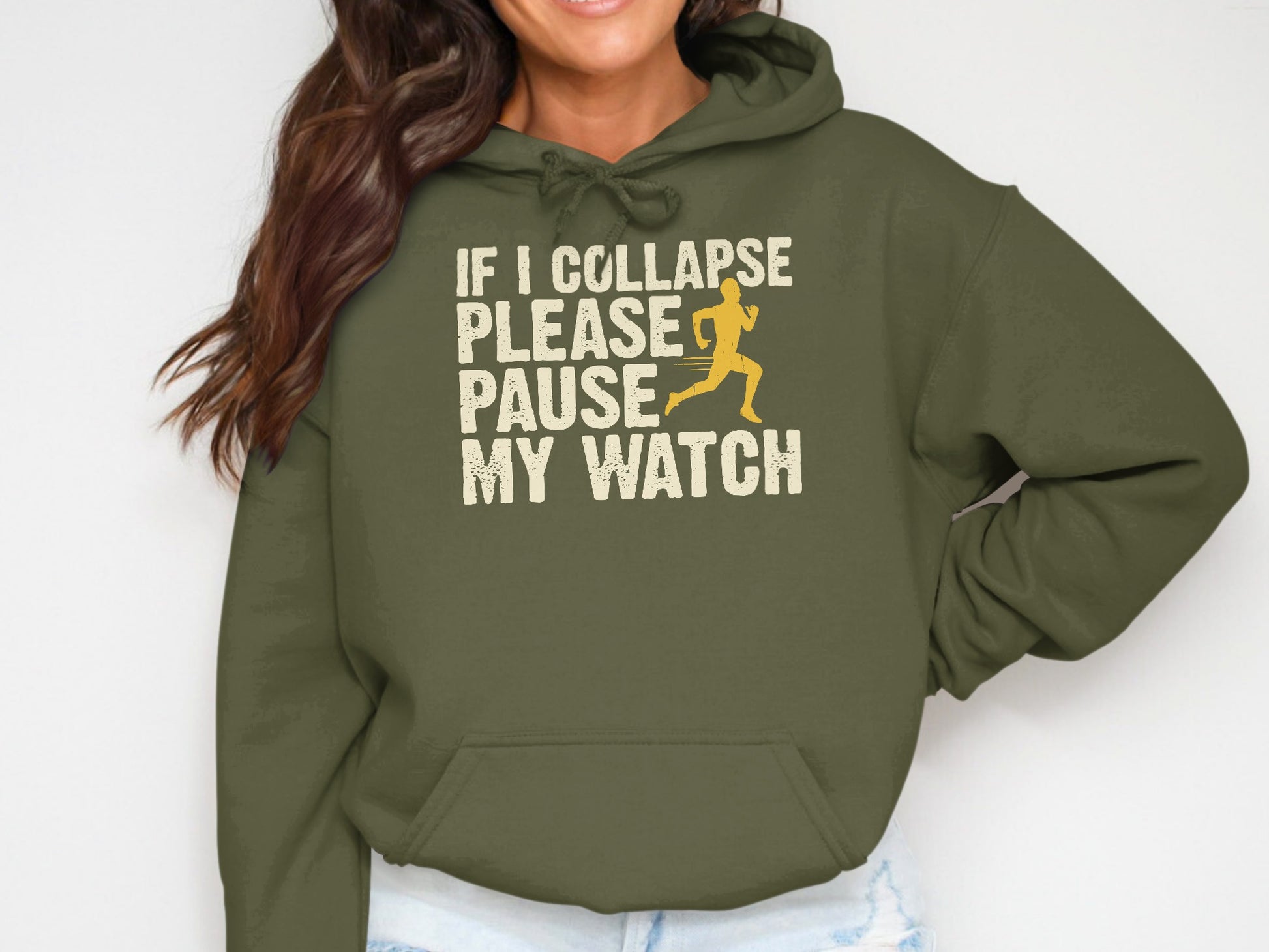 Green hoodie with text "IF I COLLAPSE PLEASE PAUSE MY WATCH" and a running figure.