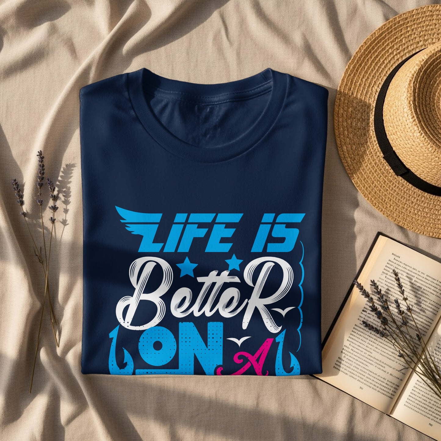 Navy blue t-shirt with "Life is Better on Vacation" text and straw hat.
