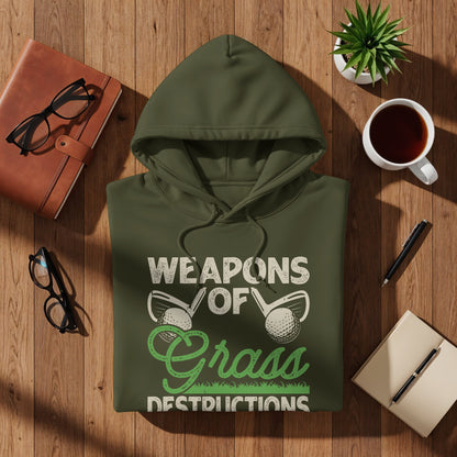 Olive green hoodie with "Weapons of Grass Destruction" text and golf graphic.