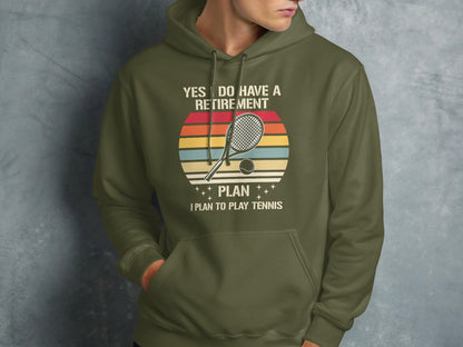 Olive hoodie with "Yes I Do Have A Retirement Plan I Plan To Play Tennis" text.