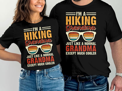 Two black t-shirts with "Hiking Grandma" graphic and sunglasses.