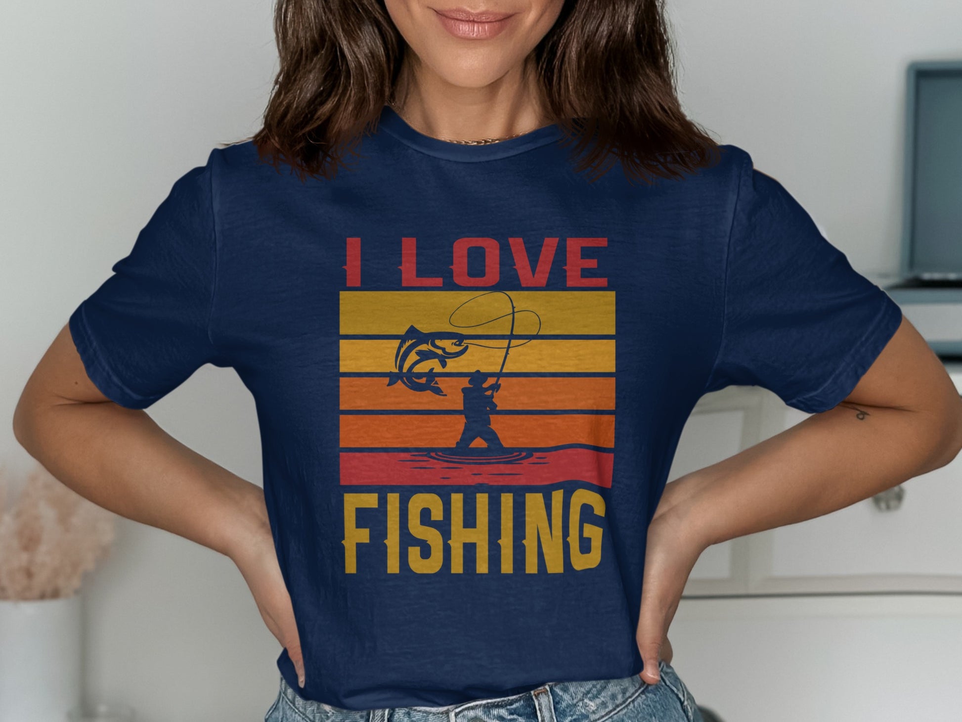 Navy t-shirt with "I LOVE FISHING" in sunset gradient lettering.