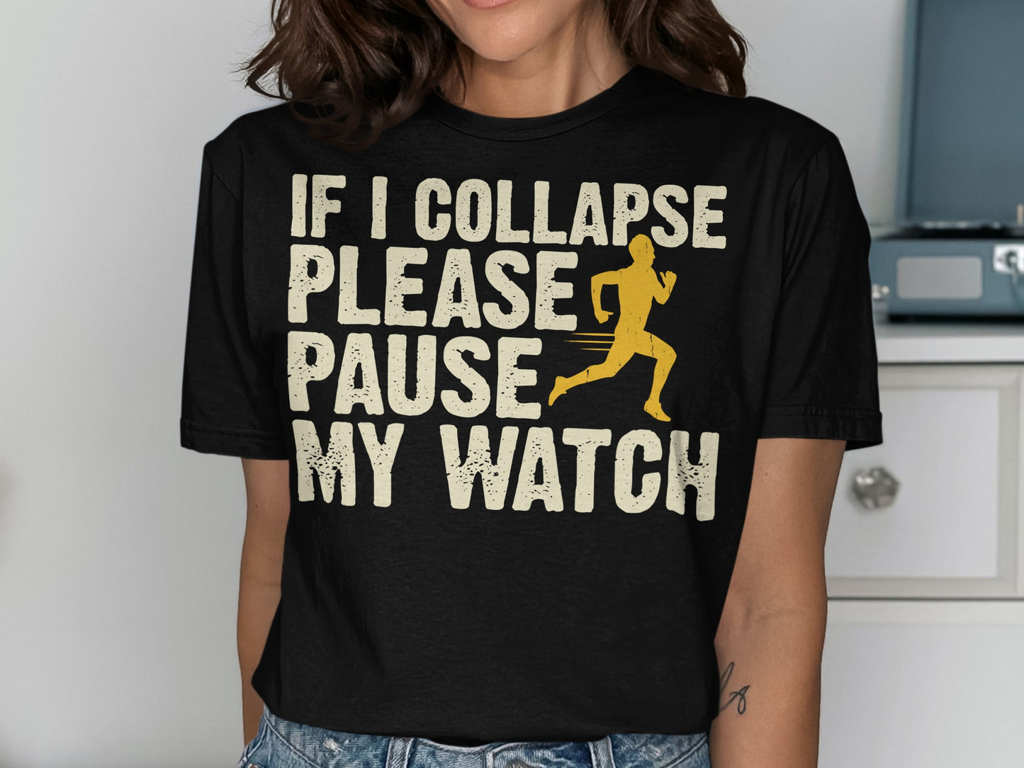 Black t-shirt with "If I Collapse Please Pause My Watch" and a runner graphic.