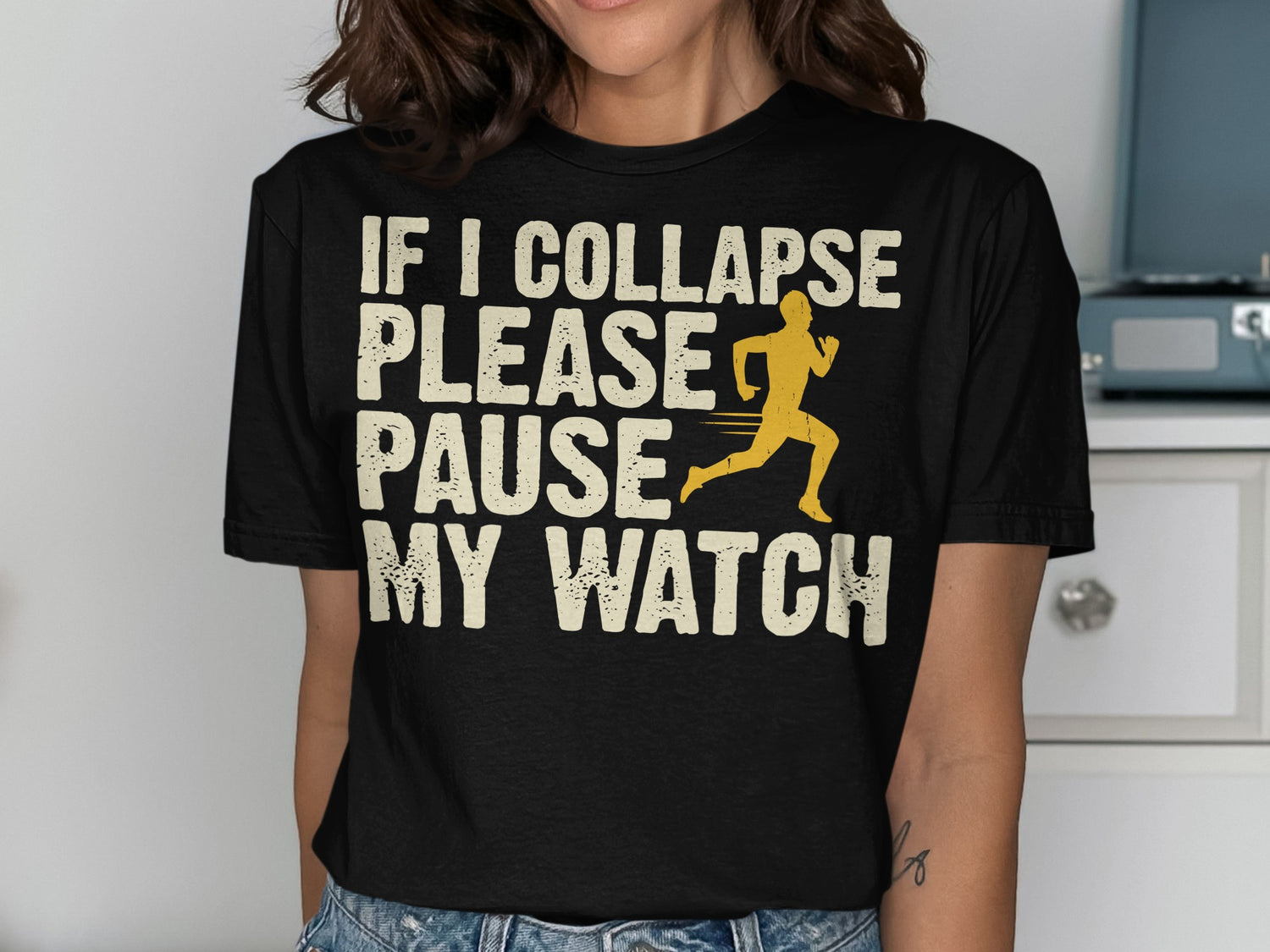 Black t-shirt with "If I Collapse Please Pause My Watch" and a runner graphic.
