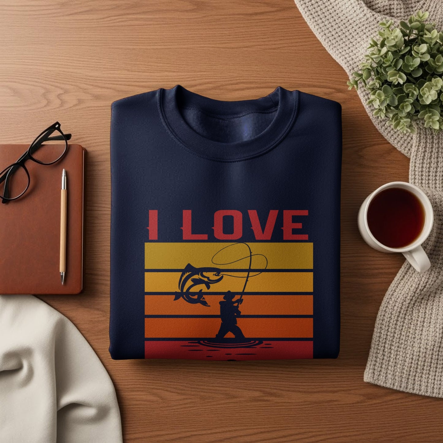 Navy sweatshirt with "I LOVE FISHING" text and jumping fish graphic.