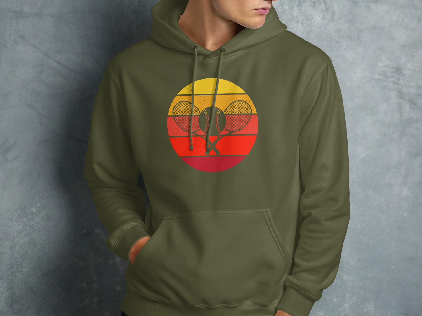 Green hoodie featuring a retro tennis graphic with rackets and a sun.