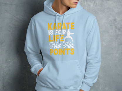 Light blue hoodie with "KARATE IS FOR LIFE NOT FOR POINTS" text and karate silhouette.