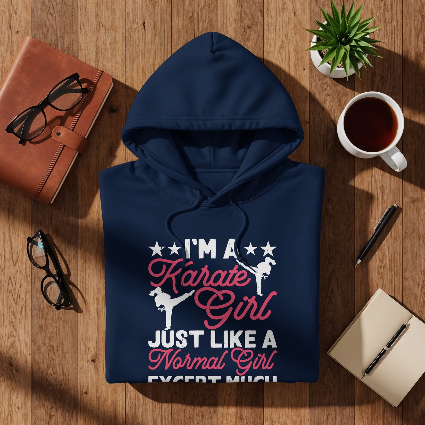 Navy blue hoodie with "I'm a Karate Girl Just Like a Normal Girl Except Much" text.