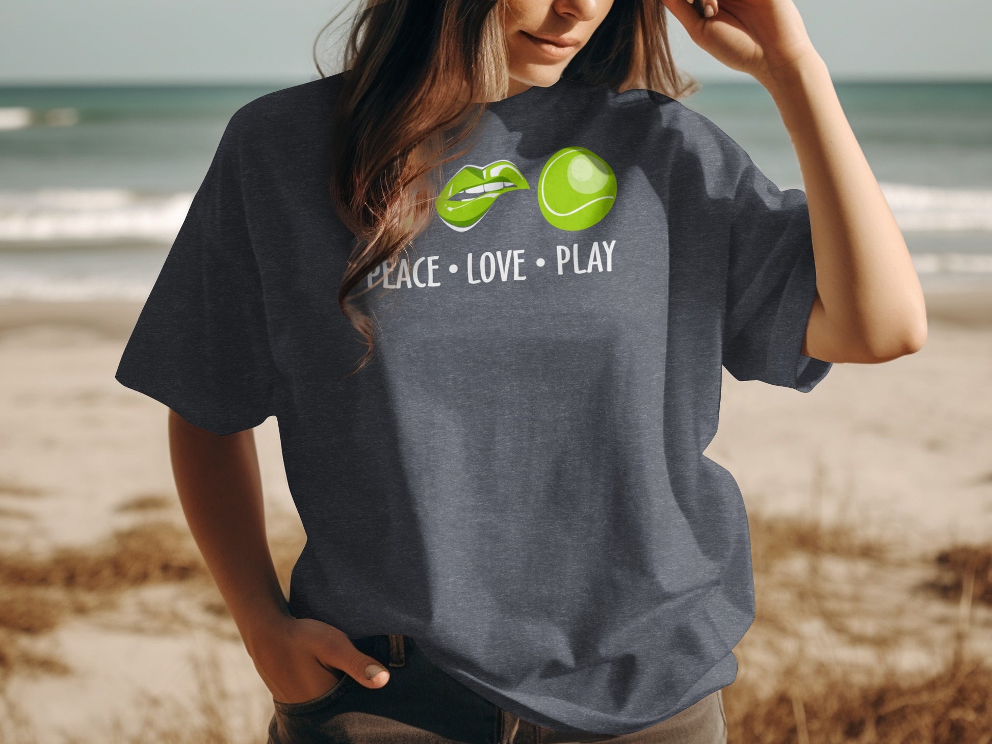 Dark t-shirt with "PEACE LOVE PLAY" and tennis ball graphics.