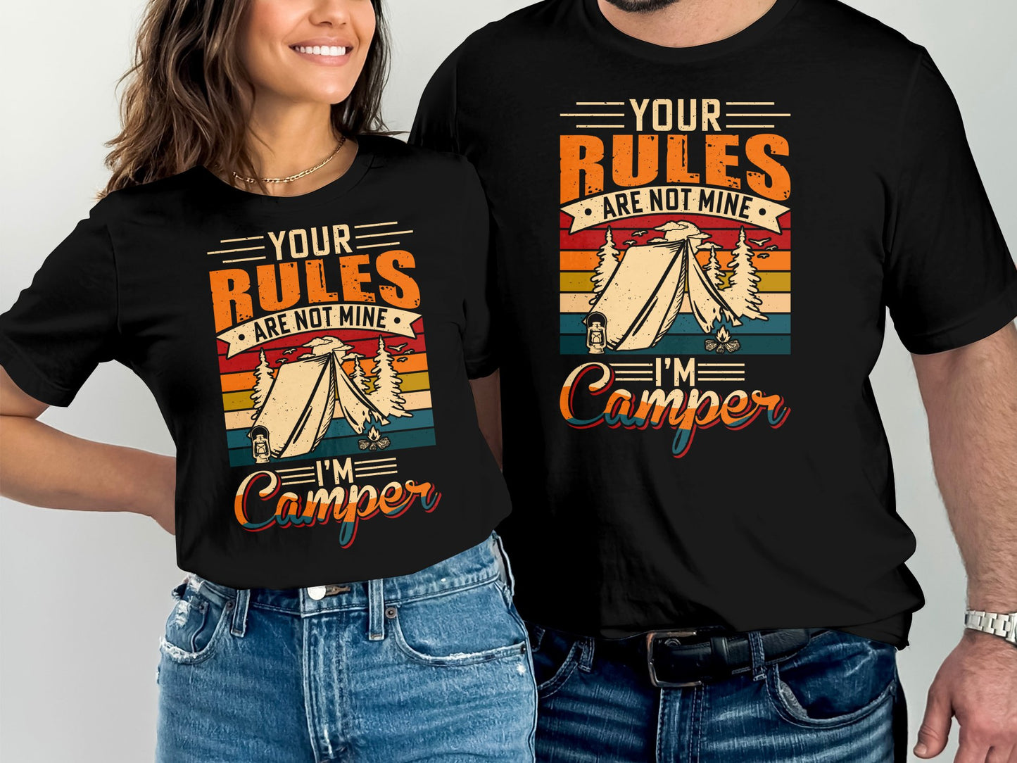 Couple wearing matching t-shirts with "Your rules are not mine, I'm a camper" text.