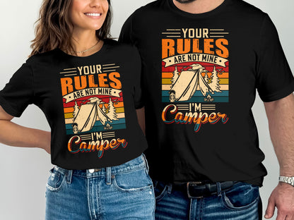 Couple wearing matching t-shirts with "Your rules are not mine, I'm a camper" text.