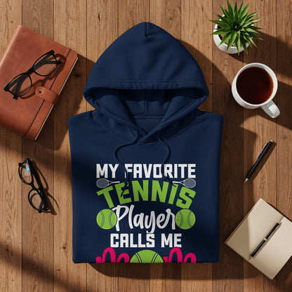 Navy blue hoodie with "My Favorite Tennis Player Calls Me" text and tennis graphics.