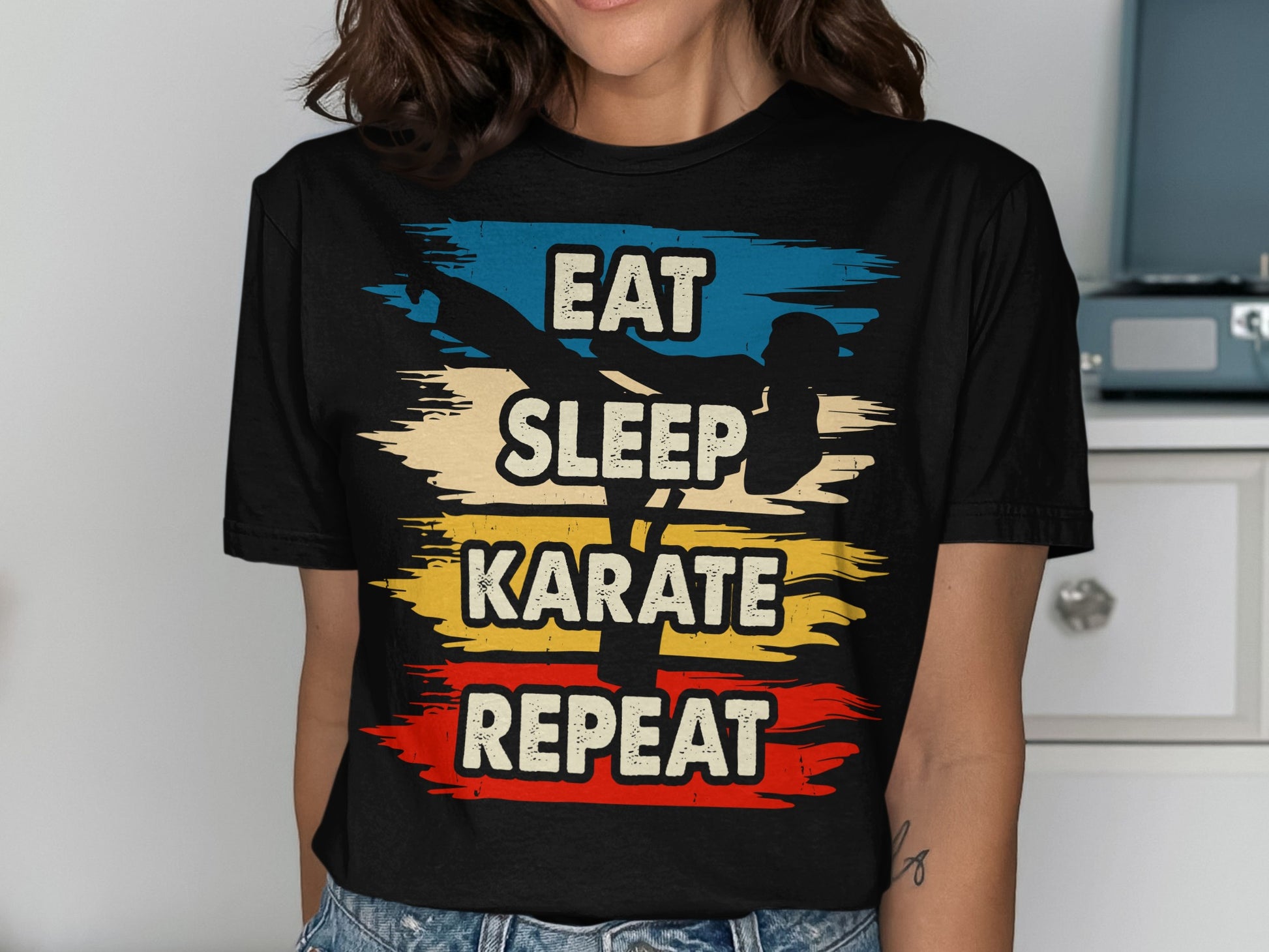 T-shirt with "Eat Sleep Karate Repeat" text and a karate silhouette.