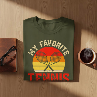 Olive green t-shirt with "My Favorite Tennis" text and crossed rackets graphic.