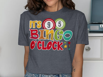T-shirt with "It's Bingo O'Clock" text and colorful bingo balls.