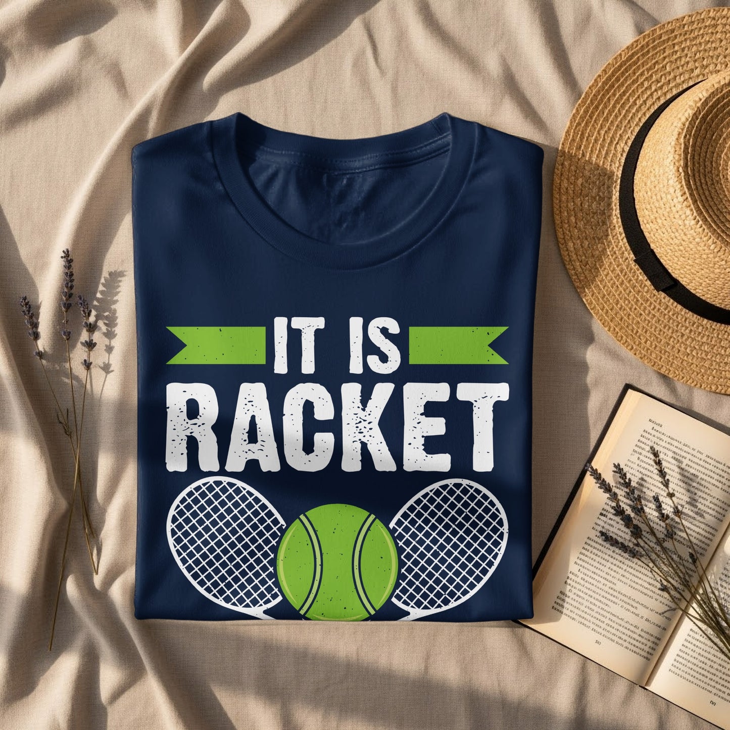 Navy t-shirt with "IT IS RACKET" text and tennis rackets.