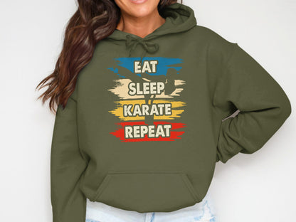 Olive green hoodie with "Eat Sleep Karate Repeat" text in colorful stripes.
