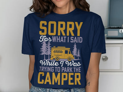 Dark blue t-shirt with "Sorry for what I said while I was trying to park the camper" text and camper graphic.