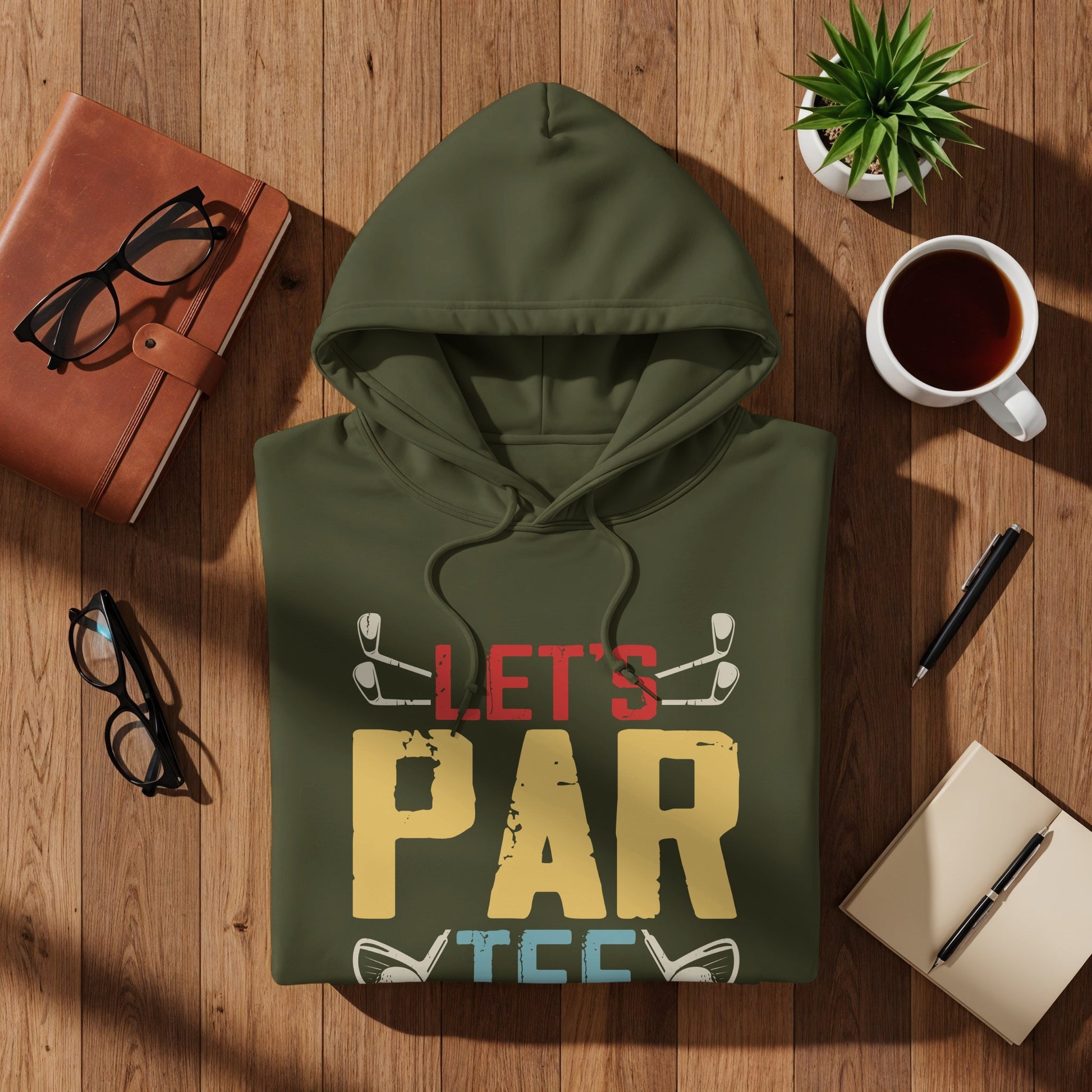 Green hoodie with "LET'S PAR TCC" graphic and golf clubs.