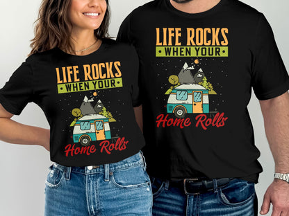 Couple wearing black t-shirts with "Life Rocks When Your Home Rolls" graphic.