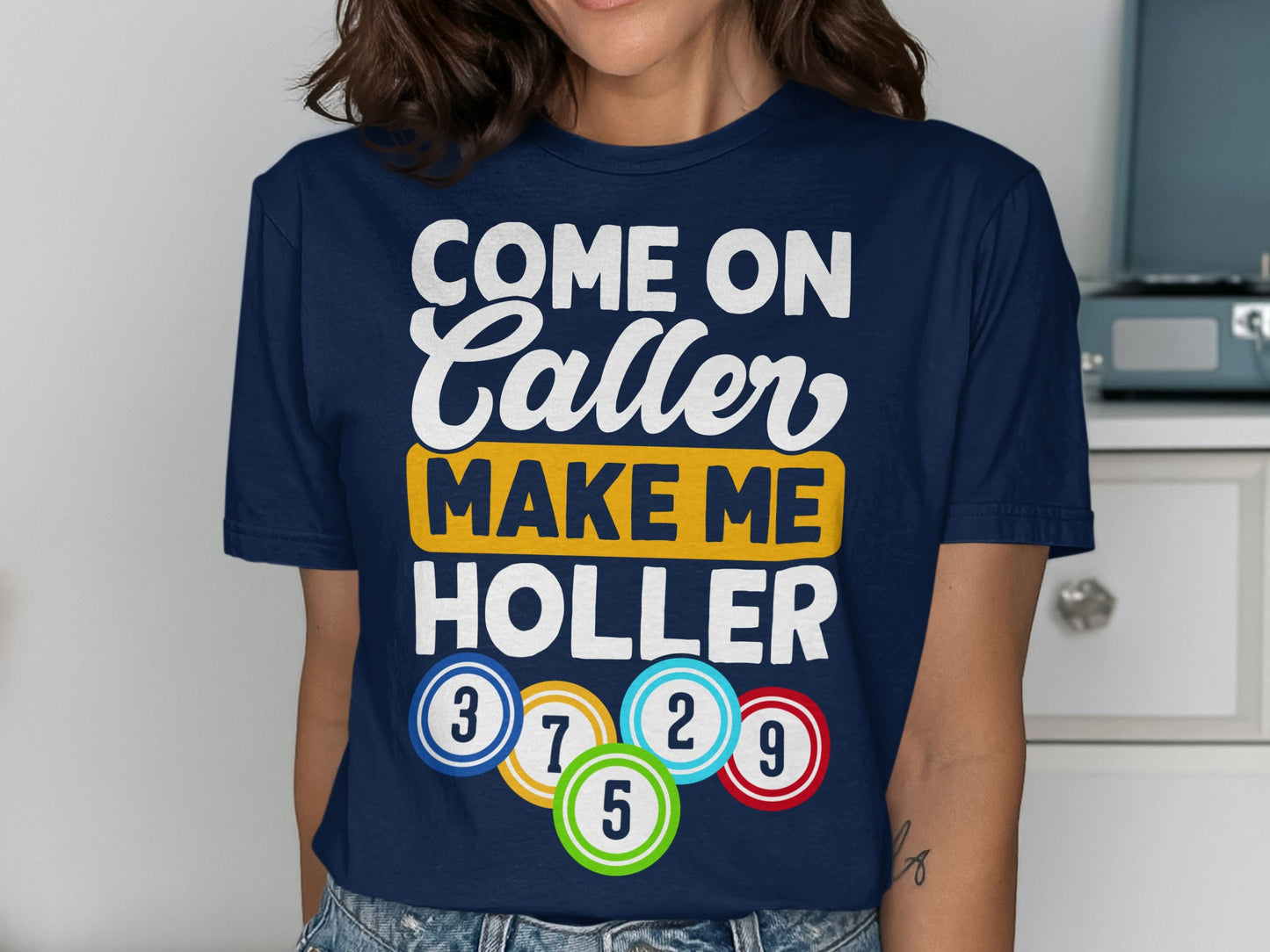Navy t-shirt with "Come On Caller Make Me Holler" and bingo balls.