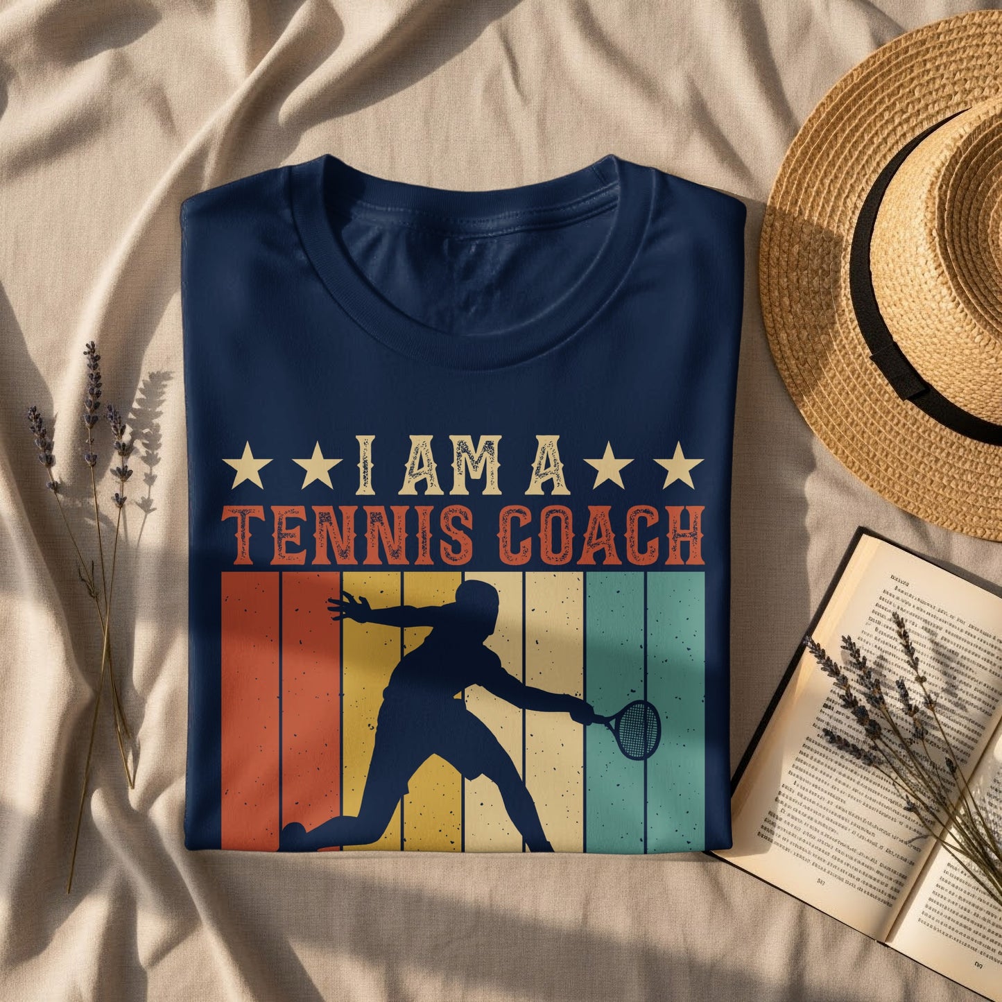 Navy t-shirt with a tennis player silhouette and "I Am A Tennis Coach" text.