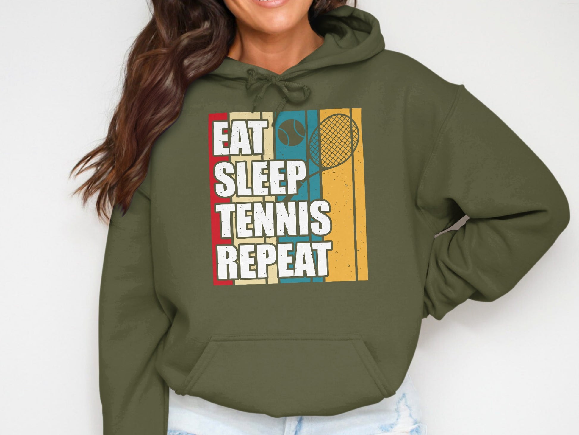 Green hoodie with "Eat Sleep Tennis Repeat" text and a tennis racket graphic.