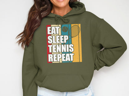 Green hoodie with "Eat Sleep Tennis Repeat" text and a tennis racket graphic.
