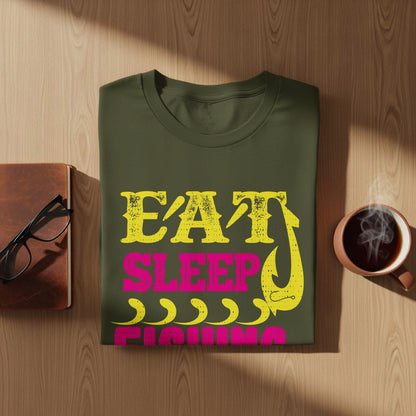 Green t-shirt with "Eat Sleep Fishing" in yellow and pink text and a fishing hook.