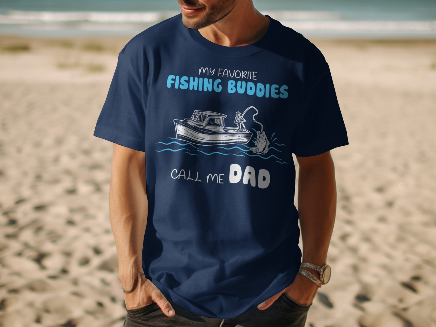 Dark blue t-shirt with "MY FAVORITE FISHING BUDDIES CALL ME DAD" text and fishing boat graphic.