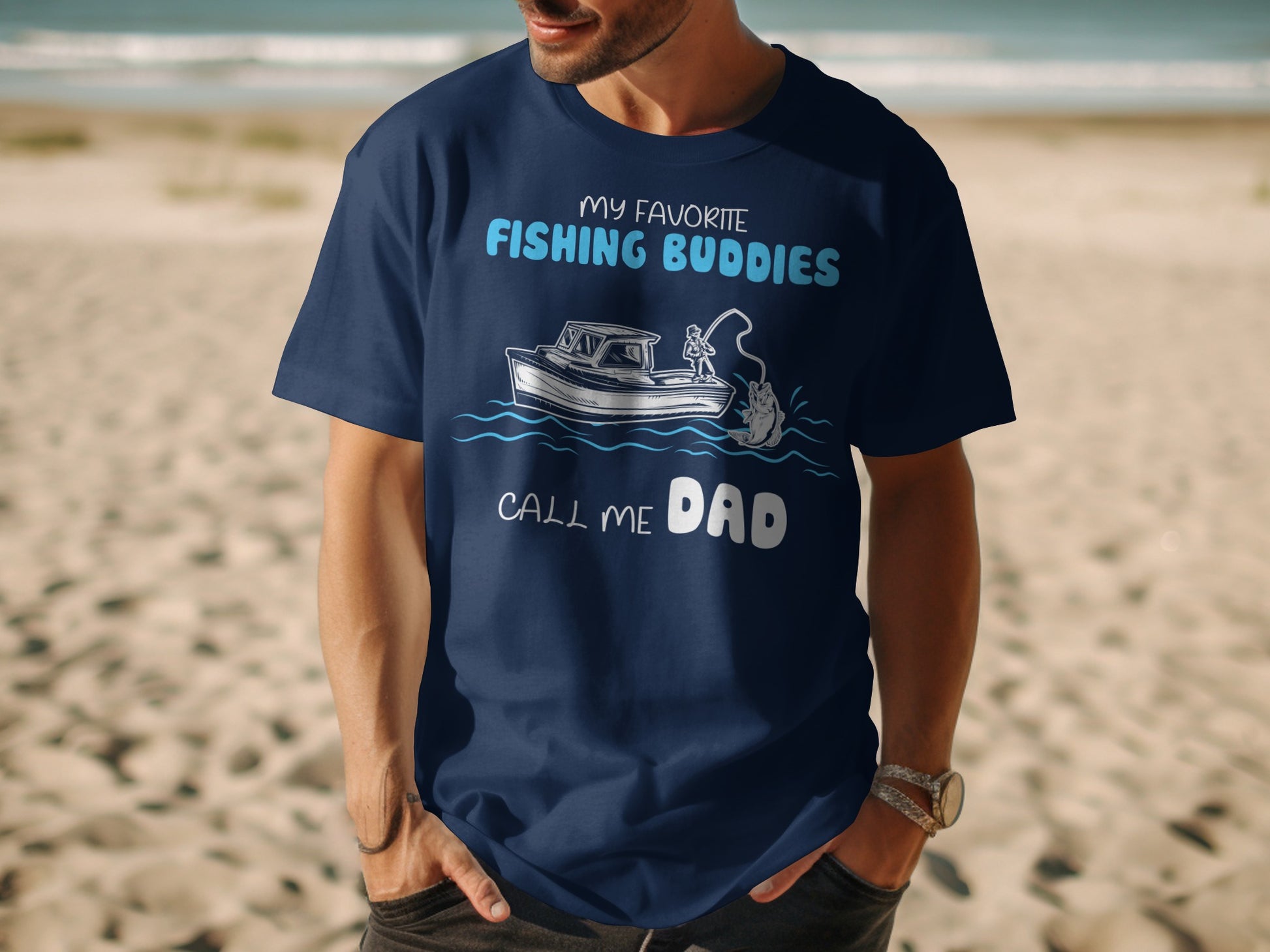 Dark blue t-shirt with "MY FAVORITE FISHING BUDDIES CALL ME DAD" text and fishing boat graphic.