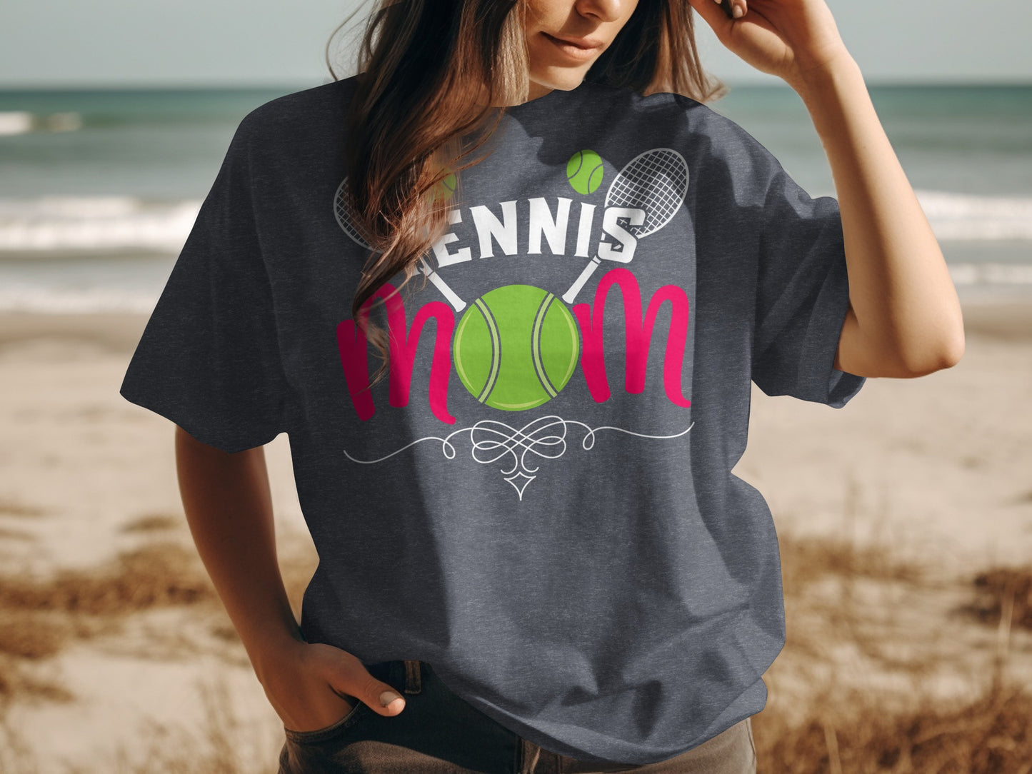Dark t-shirt with white "TENNIS MOM" text, tennis balls, and rackets.
